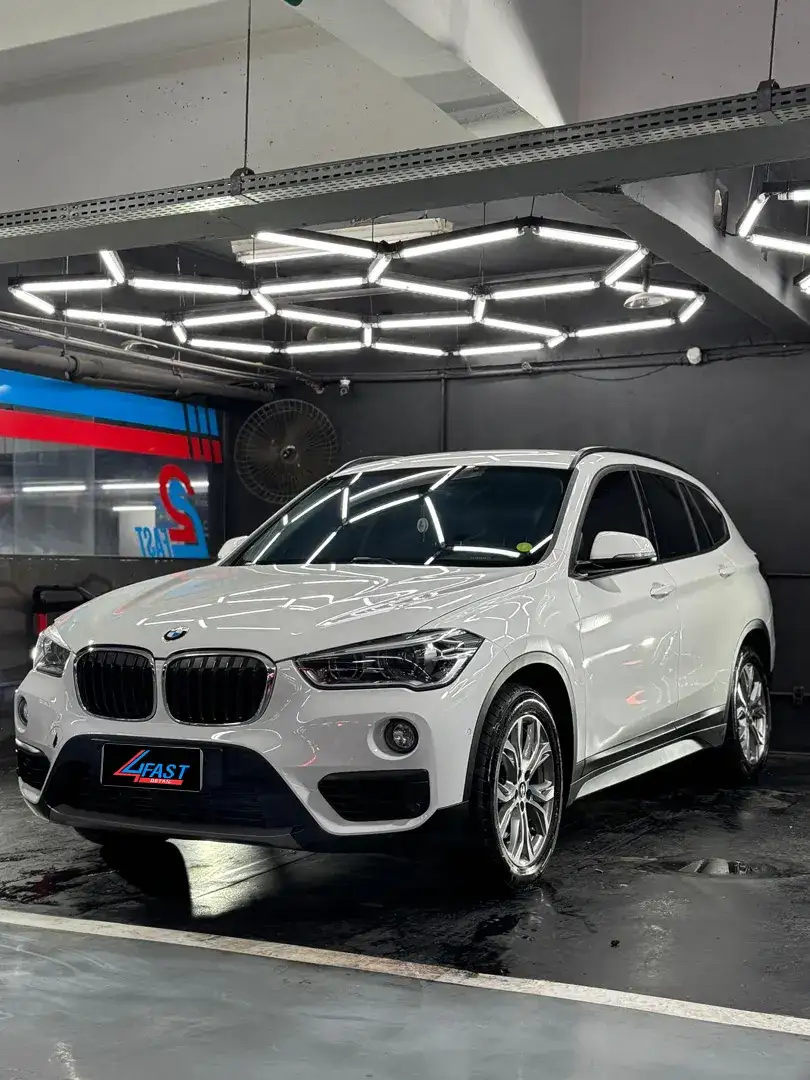 BMW X1 branca higienizada e vitrificada na 4Fast Detail